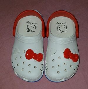 Hello Kitty White Clogs with Red Bow Accent